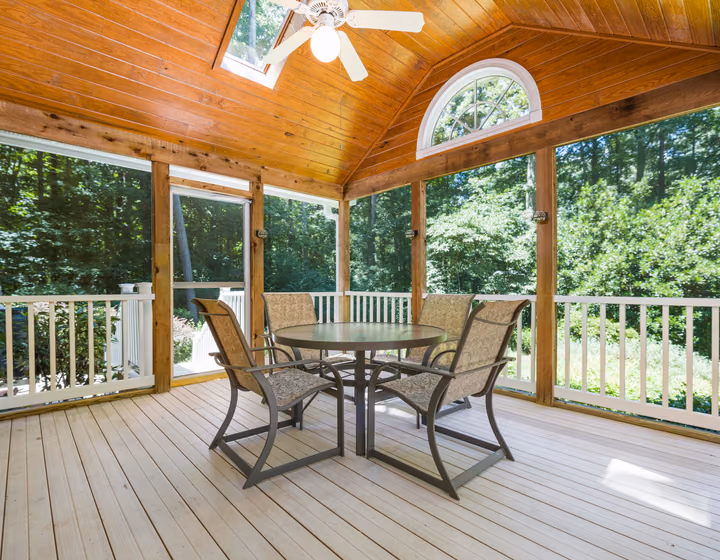 A family-sized timber deck with space for outdoor dining