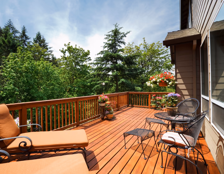 A spacious timber deck extension with room for outdoor furniture