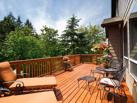 A timber deck extension with space for outdoor furniture